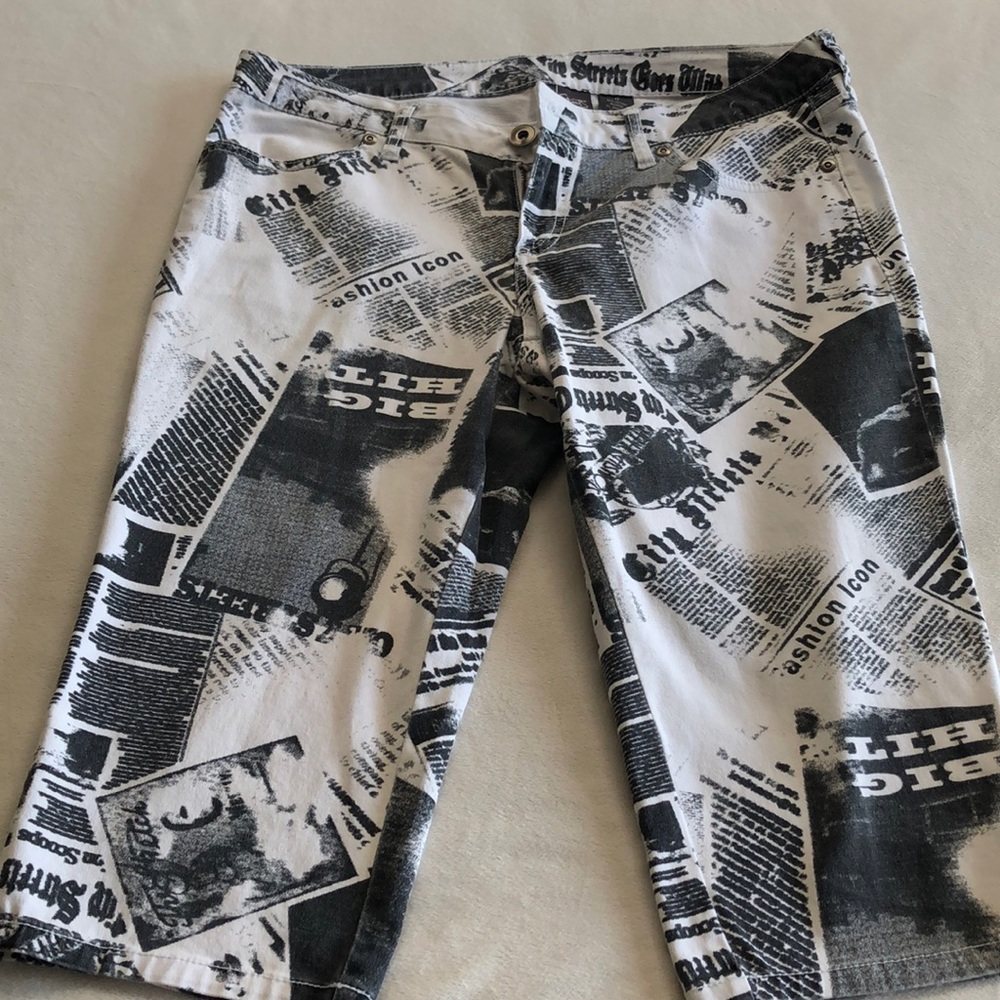 City street newspaper print capris